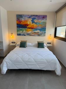 Hotel Playa de la Plata客房内的一张或多张床位