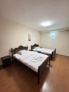 Postel nebo postele na pokoji v ubytování HOTEL IMERETI TBILISi
