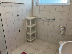 Ένα μπάνιο στο Kehl Vogt Ferien Apart +49 φωτογραφίες