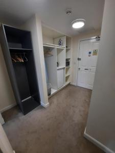 Kuchyň nebo kuchyňský kout v ubytování Dalkeith Aparthotel