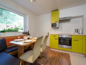 Kuchyň nebo kuchyňský kout v ubytování Special Apartment in Walchen with Private Terrace