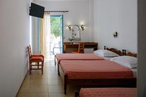 A bed or beds in a room at Armonia