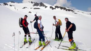 a group of people standing on skis in the snow at Skihütte Silberleiten, 14 Personen in Krimml