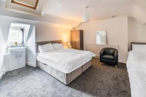 Postel nebo postele na pokoji v ubytování OYO A Better Night Hotel Limited