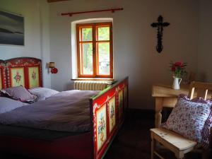 Postel nebo postele na pokoji v ubytování Roubenka na Šumavě