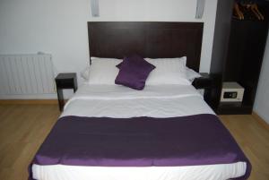 Postel nebo postele na pokoji v ubytování Hôtel Azur
