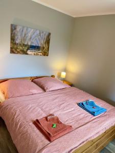 Postel nebo postele na pokoji v ubytování Ferienhaus Till & Lotte
