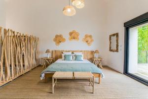 Postel nebo postele na pokoji v ubytování La Suite Corse avec Spa