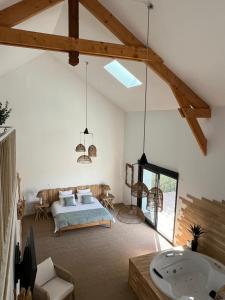 Postel nebo postele na pokoji v ubytování La Suite Corse avec Spa