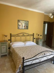 Postel nebo postele na pokoji v ubytování Agriturismo Cascina Anrì + 32 fotografií