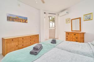 Posteľ alebo postele v izbe v ubytovaní Large One Bed Apt + 22 fotografií