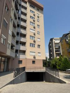 a building with bikes parked outside of it at Cozy apartment-center of Skopje in Skopje