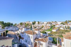 Nespecifikovaný výhled na destinaci Nerja nebo výhled na město při pohledu z prázdninového domu