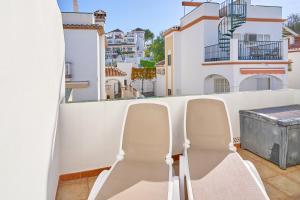 Balkón nebo terasa v ubytování Nerja Townhouse Burriana