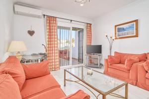 TV a/nebo společenská místnost v ubytování Nerja Townhouse Burriana