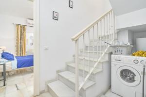 Kuchyň nebo kuchyňský kout v ubytování Nerja Townhouse Burriana