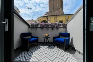 Un balcon sau o terasă la Roma Luxus Hotel