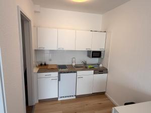 Η κουζίνα ή μικρή κουζίνα στο Schwarzwald Residenz Hirschen