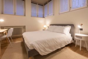 Letto o letti in una camera di Grancini Suite