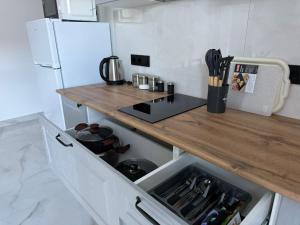A kitchen or kitchenette at Memory Apart Hotel