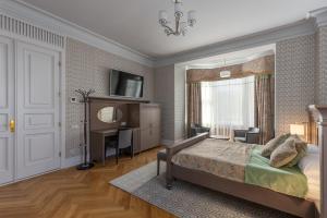 Postel nebo postele na pokoji v ubytování Roze Boutique Hotel