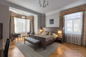 Postel nebo postele na pokoji v ubytování Roze Boutique Hotel