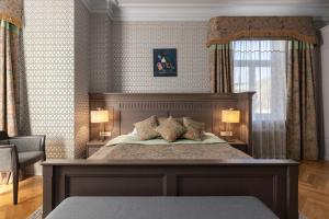 Postel nebo postele na pokoji v ubytování Roze Boutique Hotel