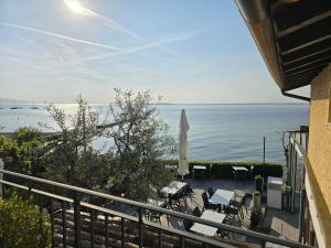 a view of the ocean from a balcony at Graziosa Al Porto in Moniga