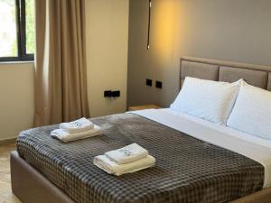 Postel nebo postele na pokoji v ubytování Hotel Tuyo