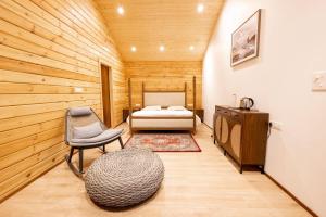 Ένα ή περισσότερα κρεβάτια σε δωμάτιο στο The Kanatal Retreat Cottages