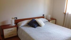 Postel nebo postele na pokoji v ubytování B&B I Pioppi + 12 fotografií
