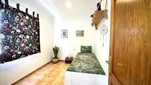 Ένα ή περισσότερα κρεβάτια σε δωμάτιο στο ZZ-Family House on the Beach by Deihu Experiences