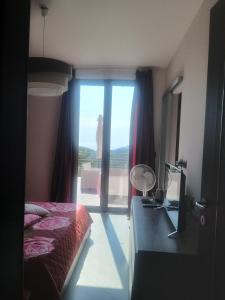 A bed or beds in a room at Suite con vista