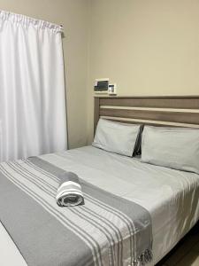 Postel nebo postele na pokoji v ubytování Apartel 477 on Bains