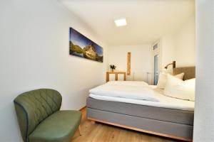 Posteľ alebo postele v izbe v ubytovaní Familienhotel Kleinwalsertal