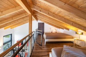 Postel nebo postele na pokoji v ubytování Ferienhaus Sonnenwind Hainer See Og