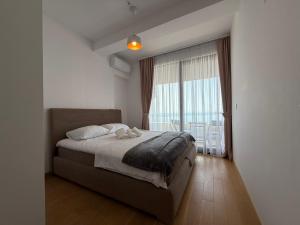 Krevet ili kreveti u jedinici u okviru objekta JUSE Seaside Retreat - Wake Up to the Adriatic Blue