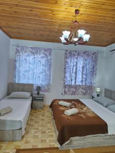 Postel nebo postele na pokoji v ubytování oneTwoSleep GuestHouse