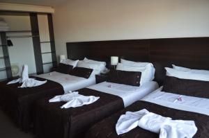 Cama ou camas em um quarto em View Hotel BRC