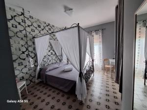 Ένα ή περισσότερα κρεβάτια σε δωμάτιο στο Hotel Pian delle Vigne +96 φωτογραφίες