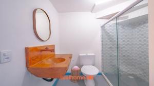 Et badeværelse på Casa em Entre Rios com Piscina Beira-Mar