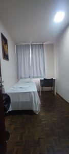 Postel nebo postele na pokoji v ubytování Hotel Flórida