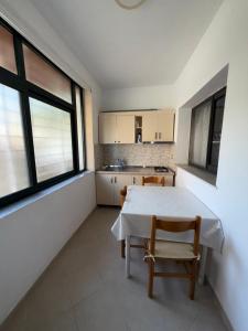 Kuchyň nebo kuchyňský kout v ubytování GuestHouse NOVI