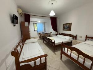 Postel nebo postele na pokoji v ubytování GuestHouse NOVI