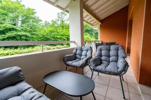 Posezení v ubytování L'appart des pins