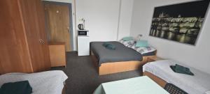 Cama o camas de una habitación en Orbis