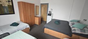 Cama o camas de una habitación en Orbis
