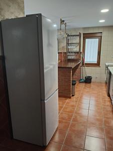 A kitchen or kitchenette at VuT Casa Fabe12