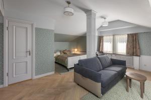 Postel nebo postele na pokoji v ubytování Roze Boutique Hotel