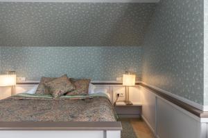 Postel nebo postele na pokoji v ubytování Roze Boutique Hotel